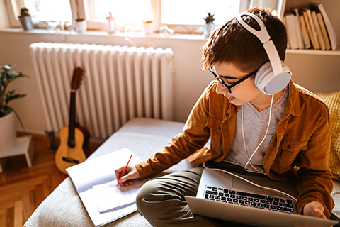 teen working on his homework