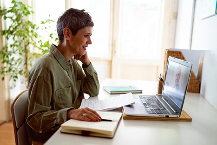 mature woman on computer at home