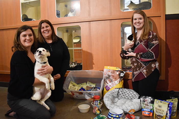 MEFCU staff with donations at paws and claws